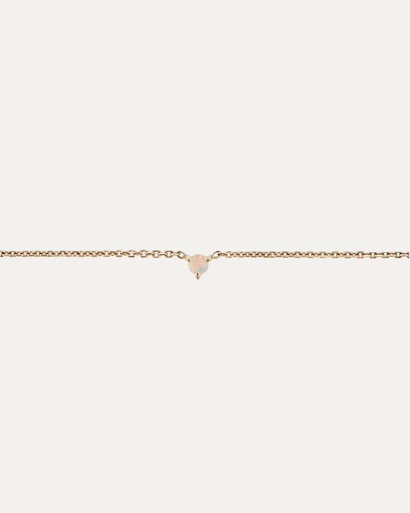SARAH & SEBASTIAN The Petite Opal Birthstone Bracelet in Yellow Gold — detail view
