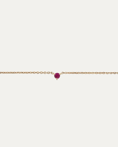 SARAH & SEBASTIAN The Petite Ruby Birthstone Bracelet in Yellow Gold — detail view