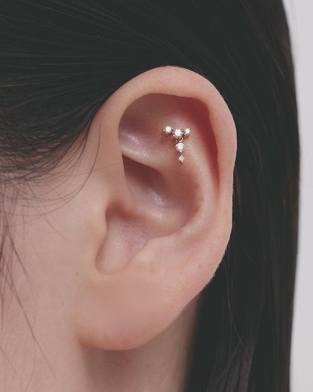SARAH & SEBASTIAN Tiny Urchin Cartilage Earring in Yellow Gold — detail view